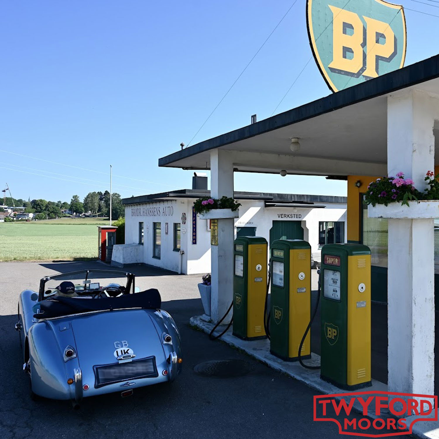 Jaguar XK120 at fuel station
