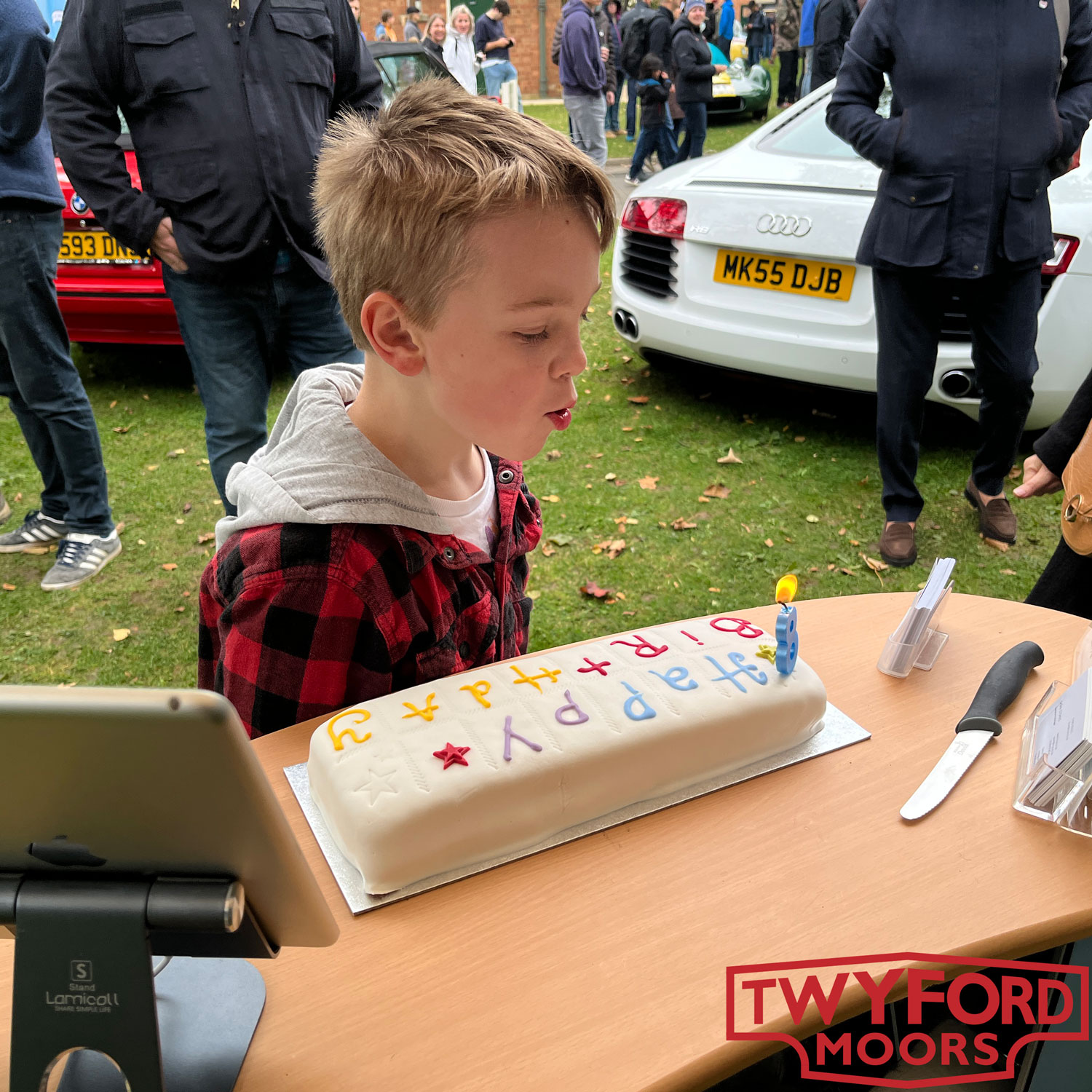 Blowing out candles at Bicester Heritage