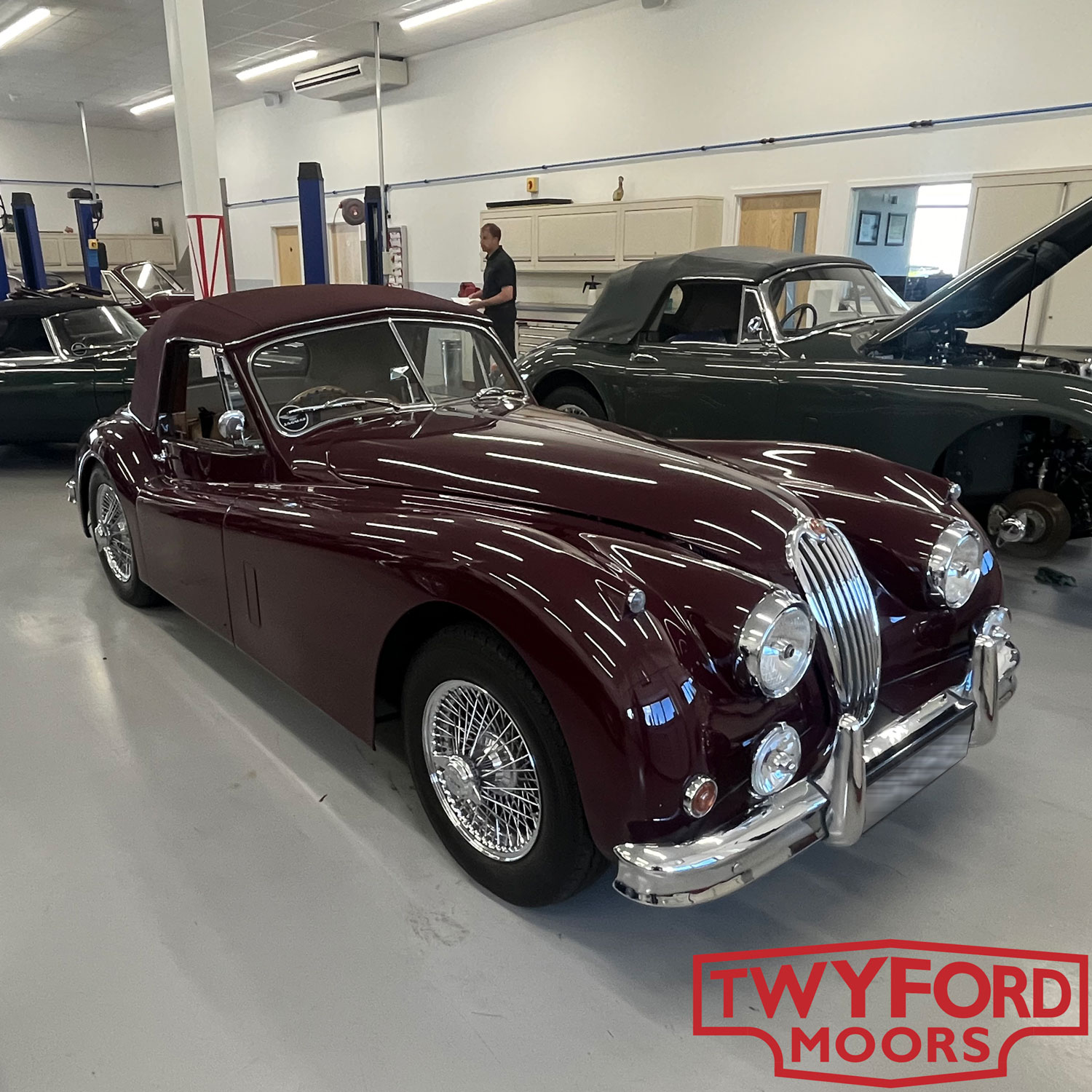 Jaguar XK140 in classic car workshop